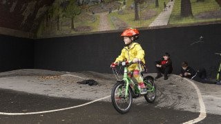 Image of a little boy riding a bike