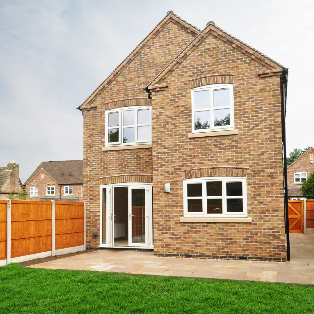 An exterior photograph showing the rear of the property