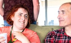 Two people sat enjoying themselves.