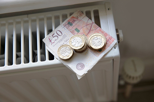 Picture of money on a home radiator heater