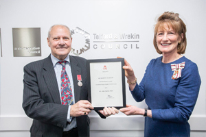 Picture of the BEM presentation with John Minor