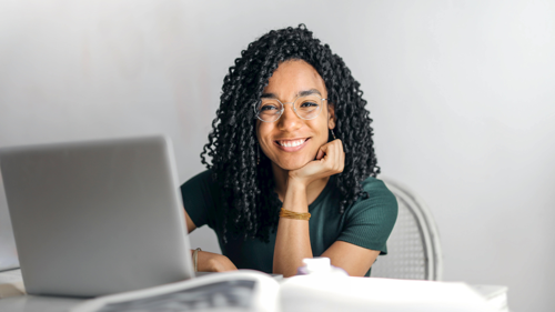Girl Smiles with Glasses