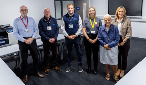 Five Council staff members and Councillor Shirley Reynolds standing in a newly completed classroom at Telford Park School.