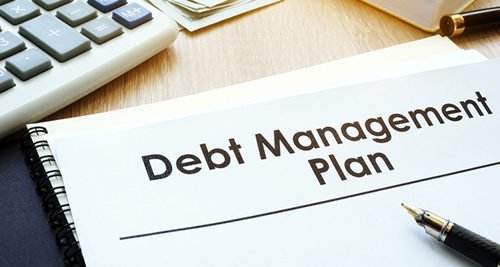 Debt Management Plan on a table
