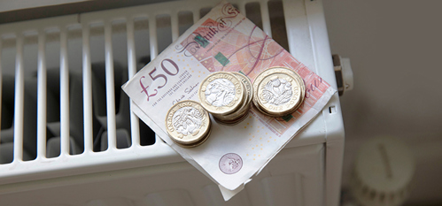 Picture of money on a home radiator heater