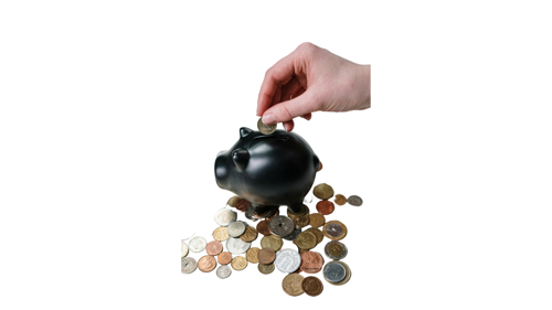 A photograph of coins being placed in a piggy bank