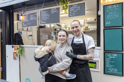 A photo of chefs Matt Palin and Wioleta Odrakiewic, owners of Of Pals in Wellington Market's Food Court.