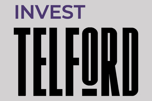 The words "Invest Telford" layered on top of a grey background