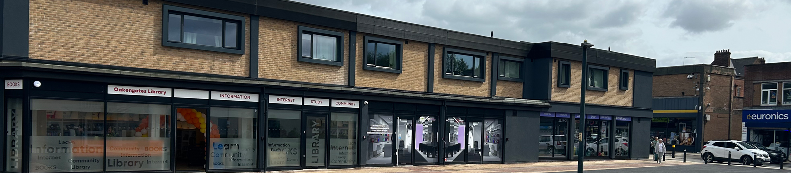 A picture of the outside entrance of the new transformed shops at Limes Walk in Oakengates.
