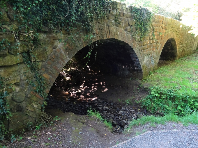 Grade II listed c. 1759 bridge in Newdale which carried a plate railway from Coalbrookdale to Donnington Wood