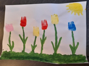 Painting of flowers using forks - created by a Year 1 pupil