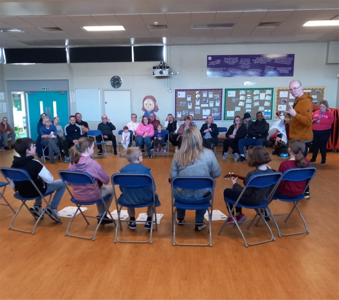 A joint cluster music event where young people had a go at playing the ukulele, flute and samba band instruments with a mini performance at the end of the workshop, held in February 2023